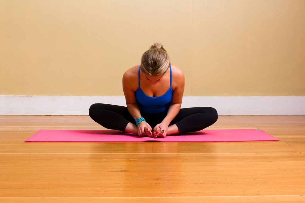 5 Restorative Yoga Poses You Can Do With Props You Have at Home